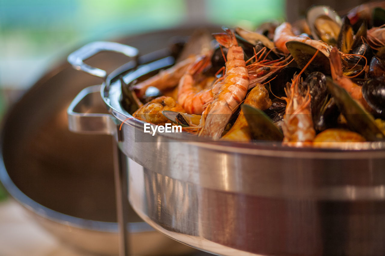 Close-up of seafood in container on table