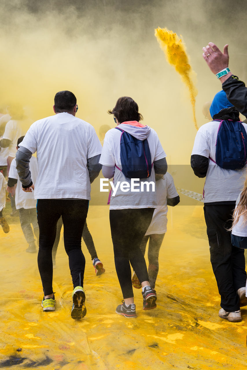 Rear view of people during holi