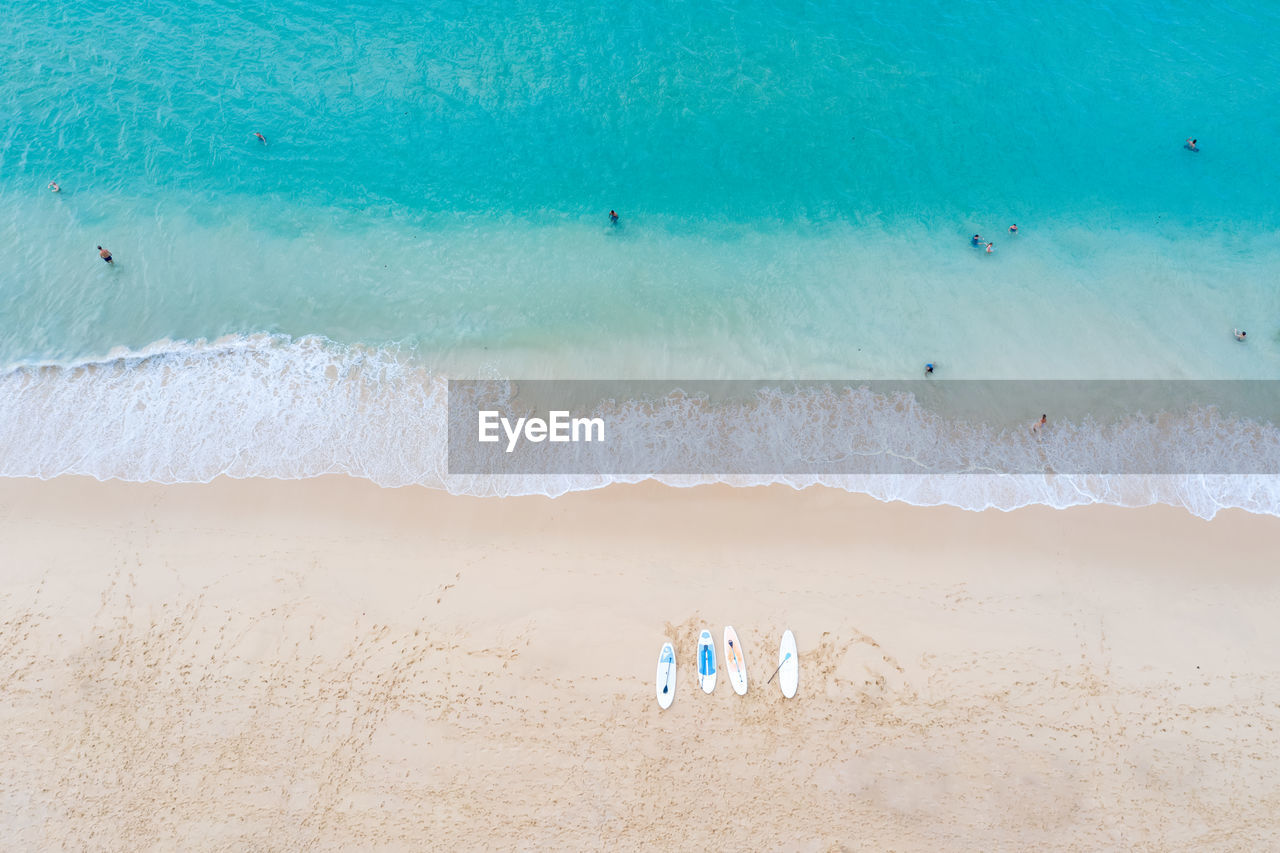 Surin beach and tourists travel location summer holiday in thailand aerial top view