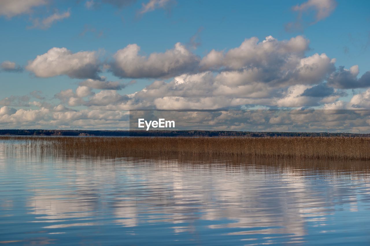 PANORAMIC VIEW OF LAKE AGAINST SKY