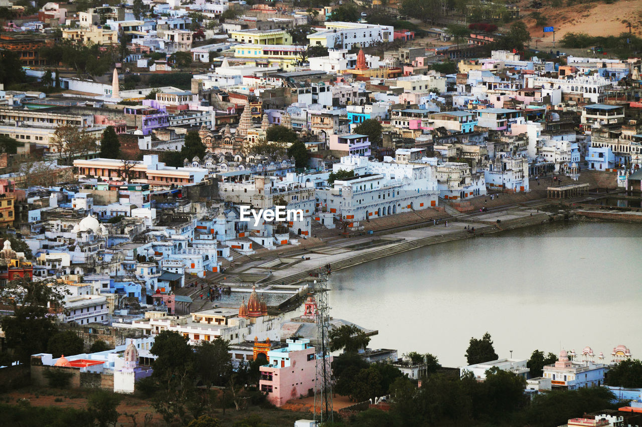 High angle view of residential district and lake