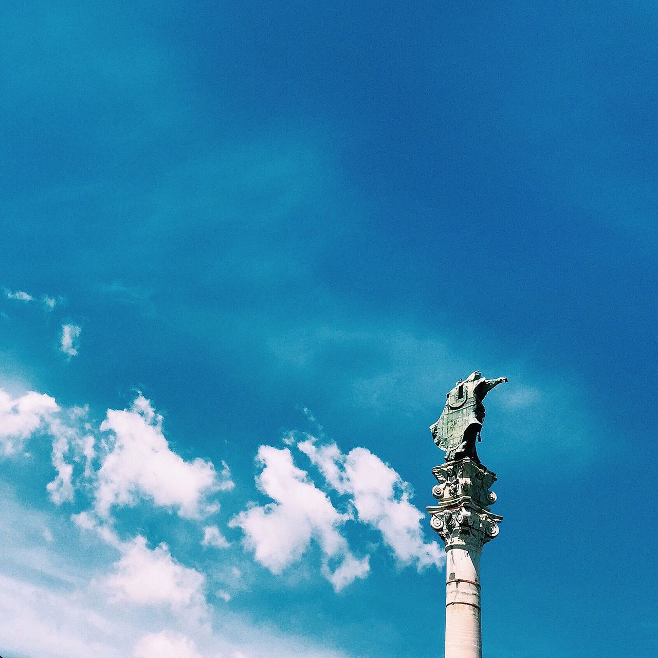 Column of sant oronzo against blue sky
