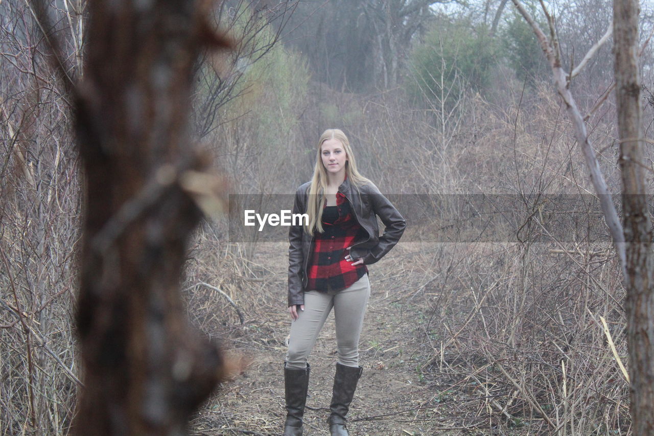 Young woman in forest