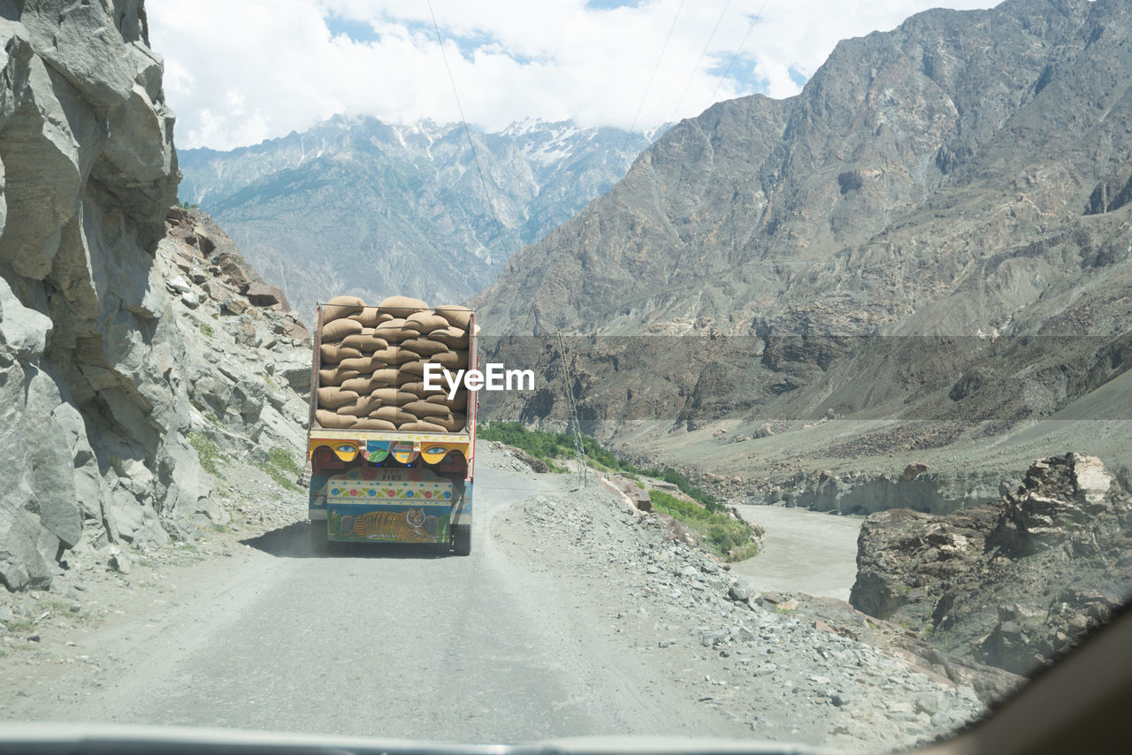 ROAD LEADING TOWARDS MOUNTAINS