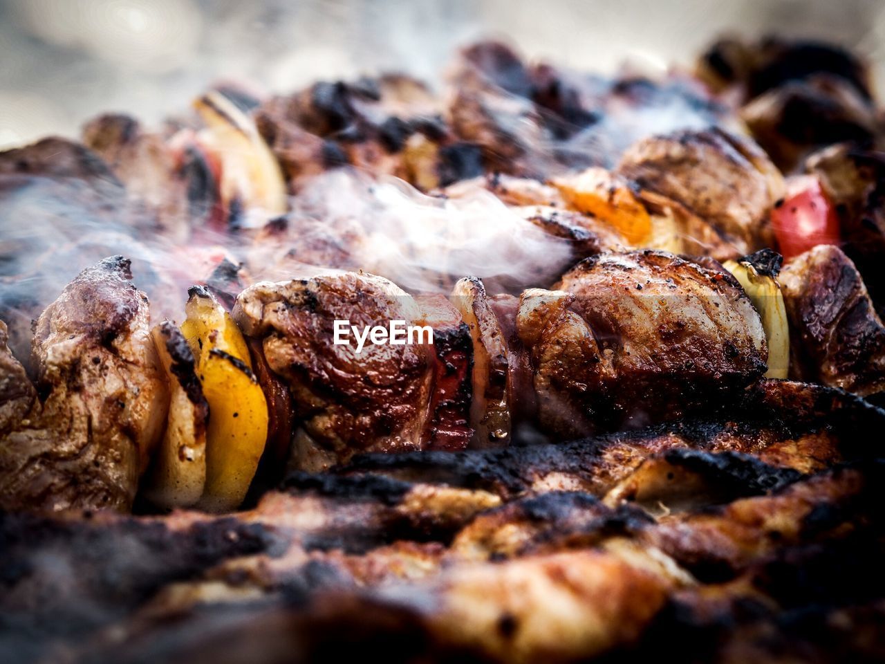 Close-up of steam raising from grilled meat