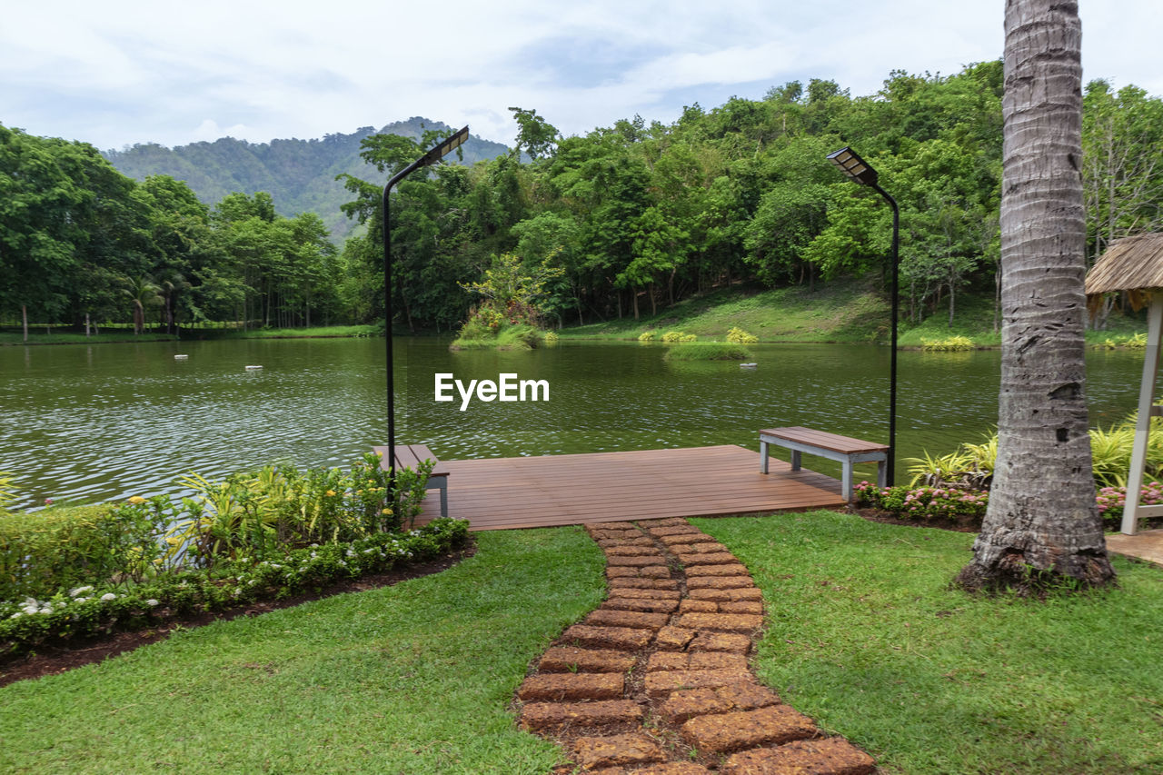 scenic view of lake against trees