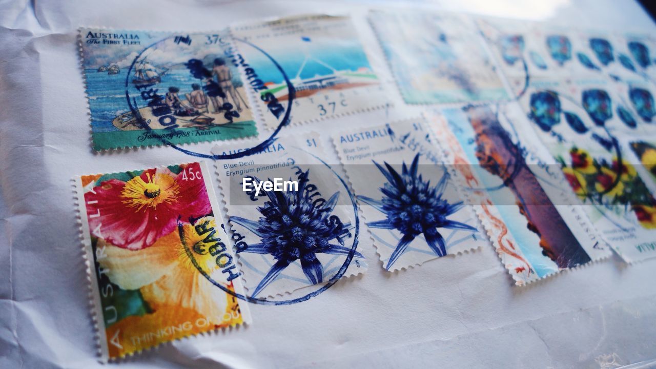 Close-up of vintage mail envelope with postage stamps