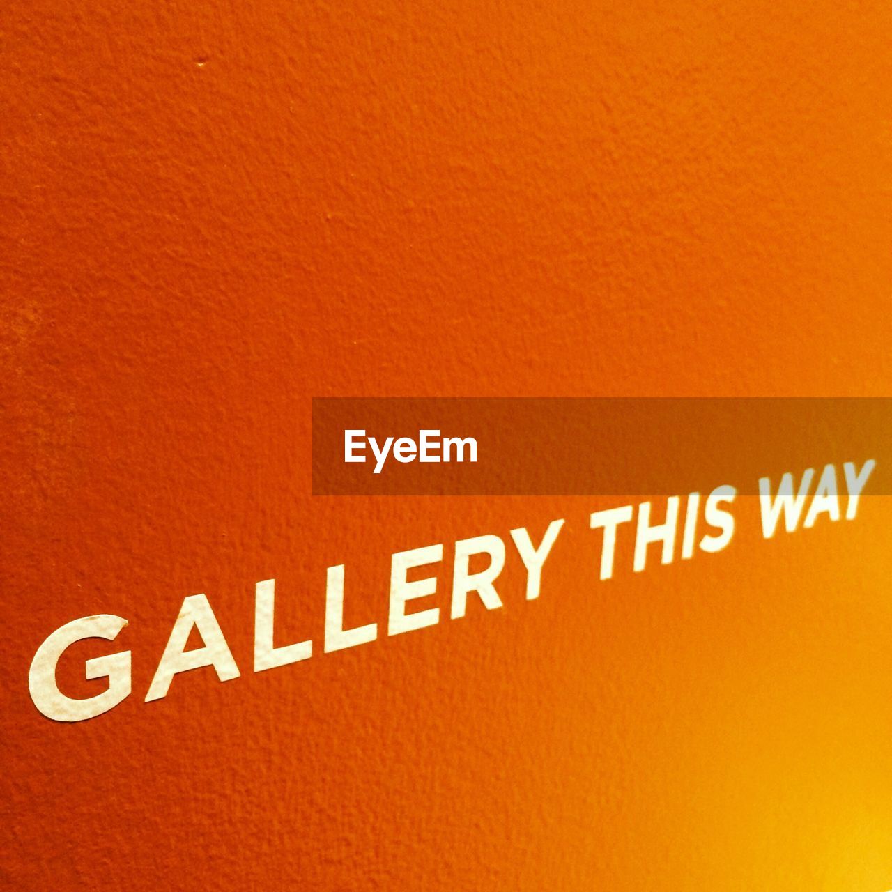 Directional sign in orange