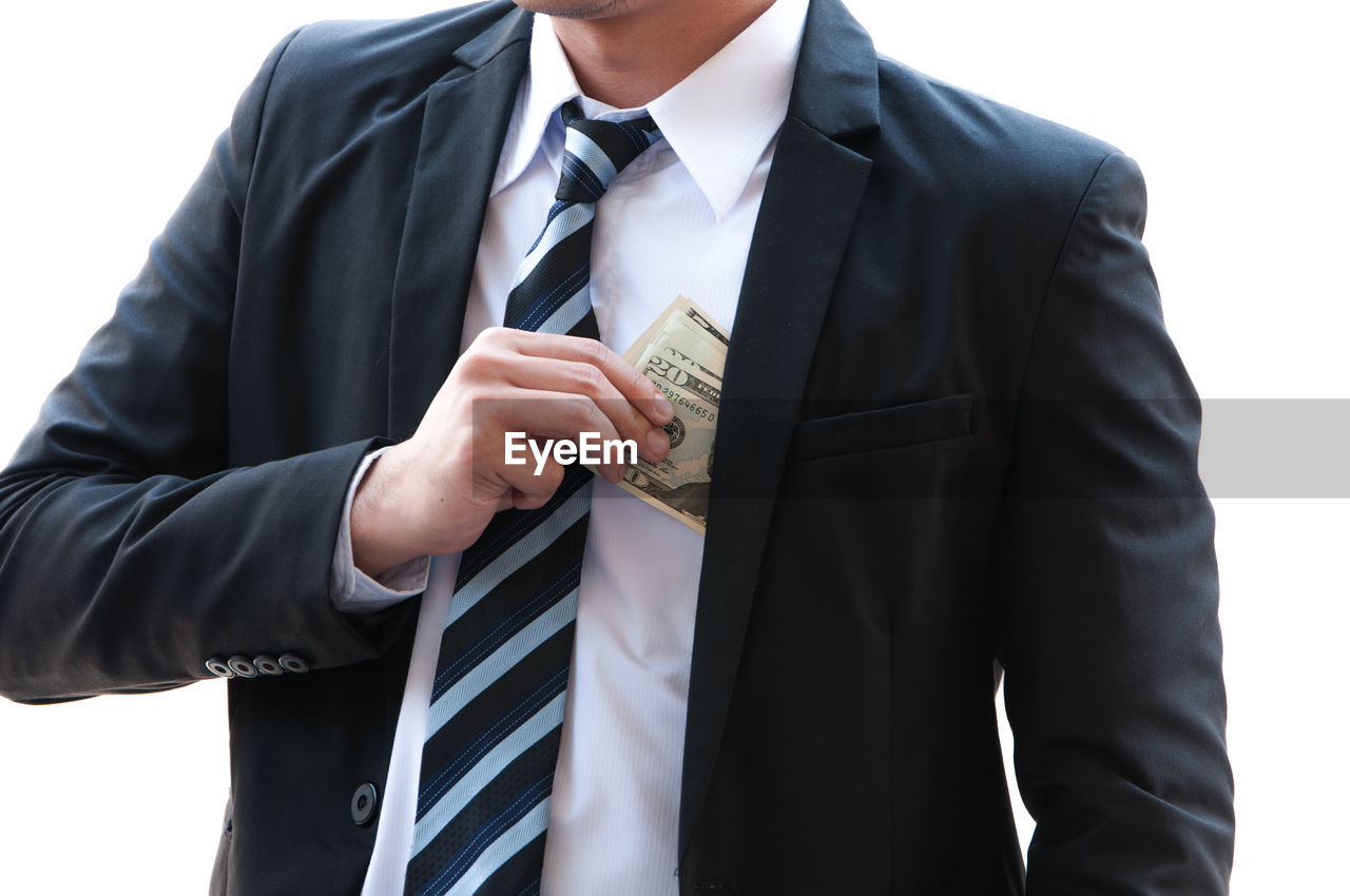 Business man holding banknote in his hand planning to invest with something, business man invest new 