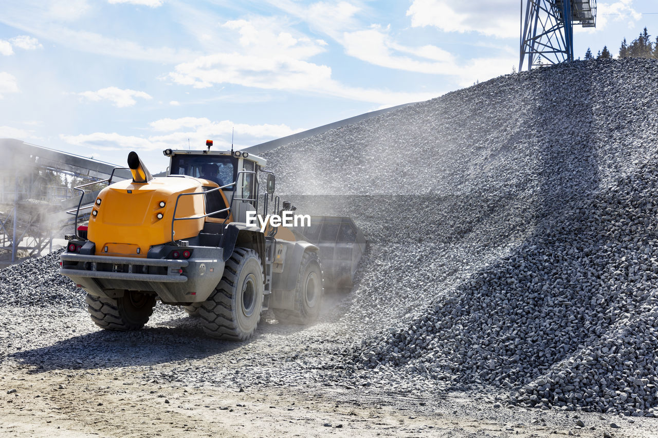 Bulldozer working in gravel pit