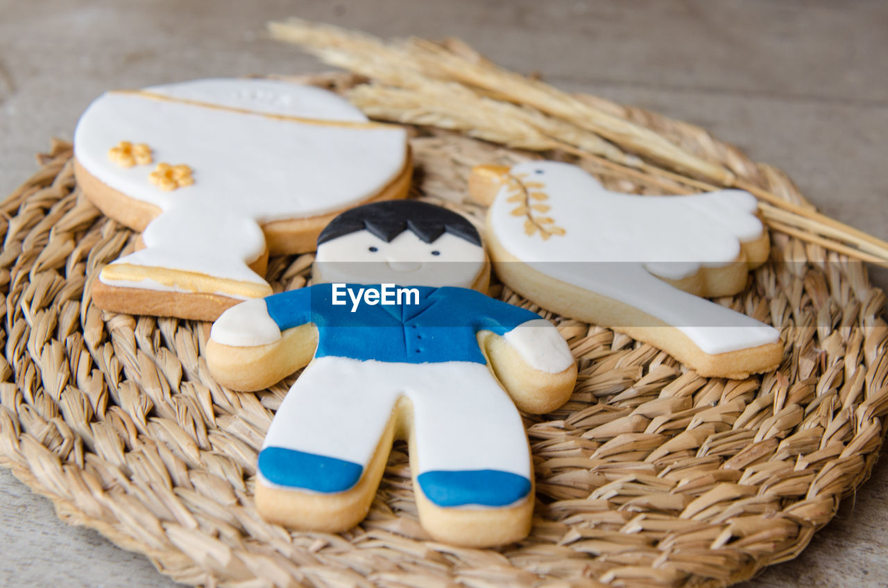 Close-up of cookies on straw placemat