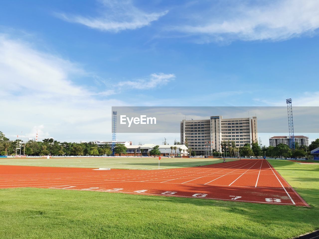 View of soccer field against cloudy sky