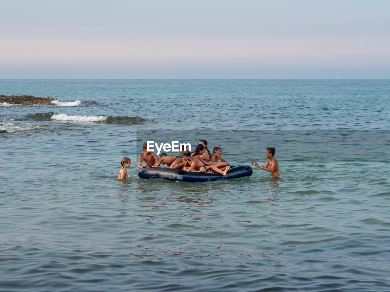 PEOPLE ENJOYING IN SEA