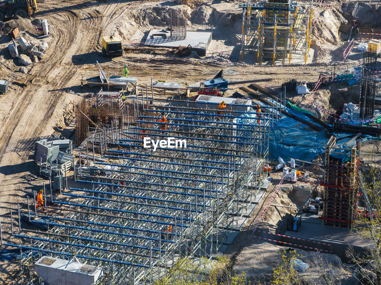 aerial photography, high angle view, industry, architecture, urban area, day, business finance and industry, nature, no people, outdoors, built structure, aerial view, sunlight, construction industry, transportation, arena, construction site, cityscape