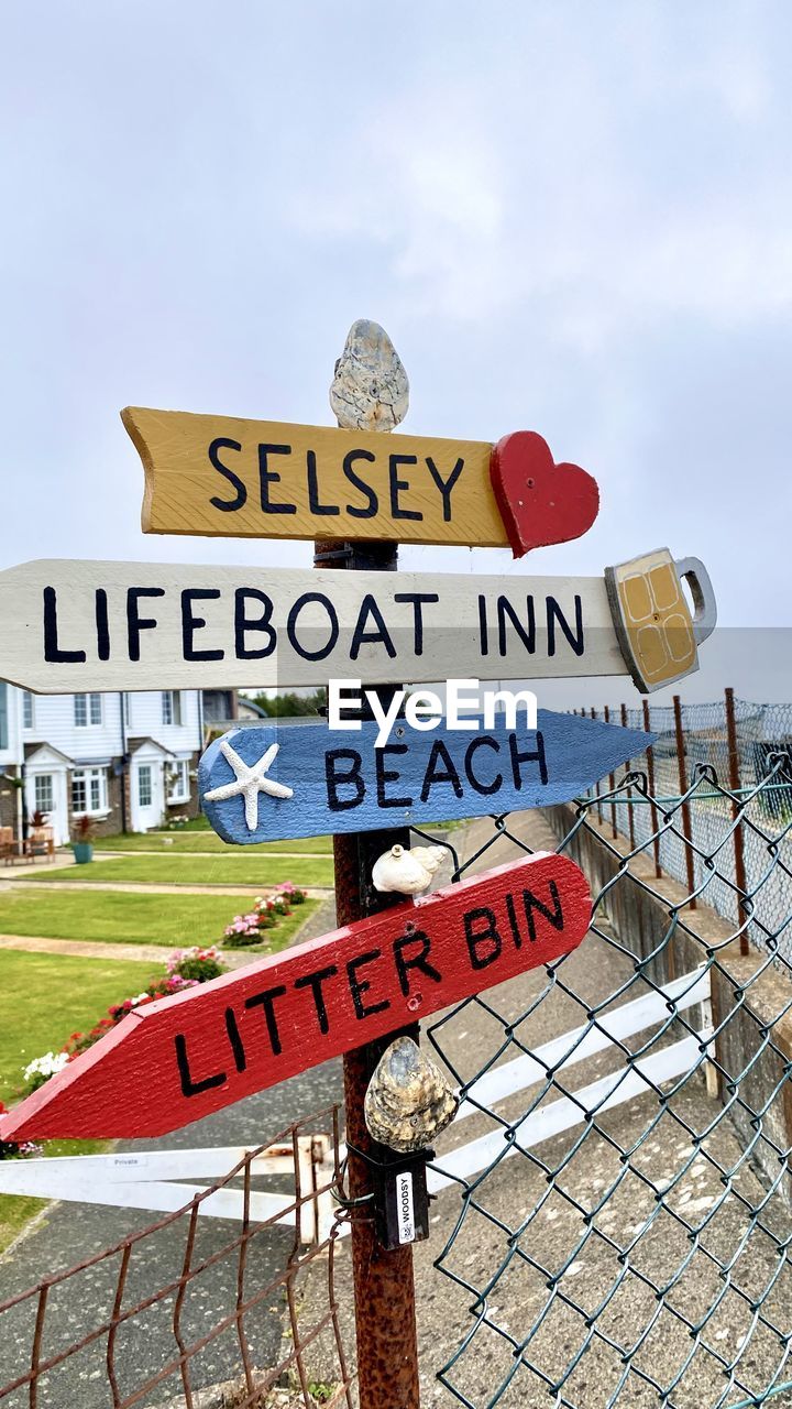 INFORMATION SIGN AGAINST SKY
