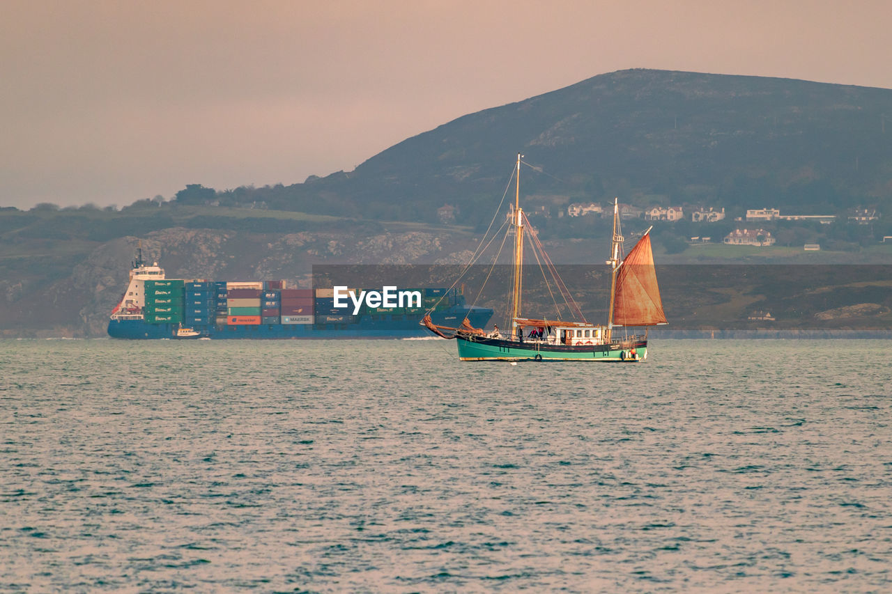 Yacht and ship in dublin bay
