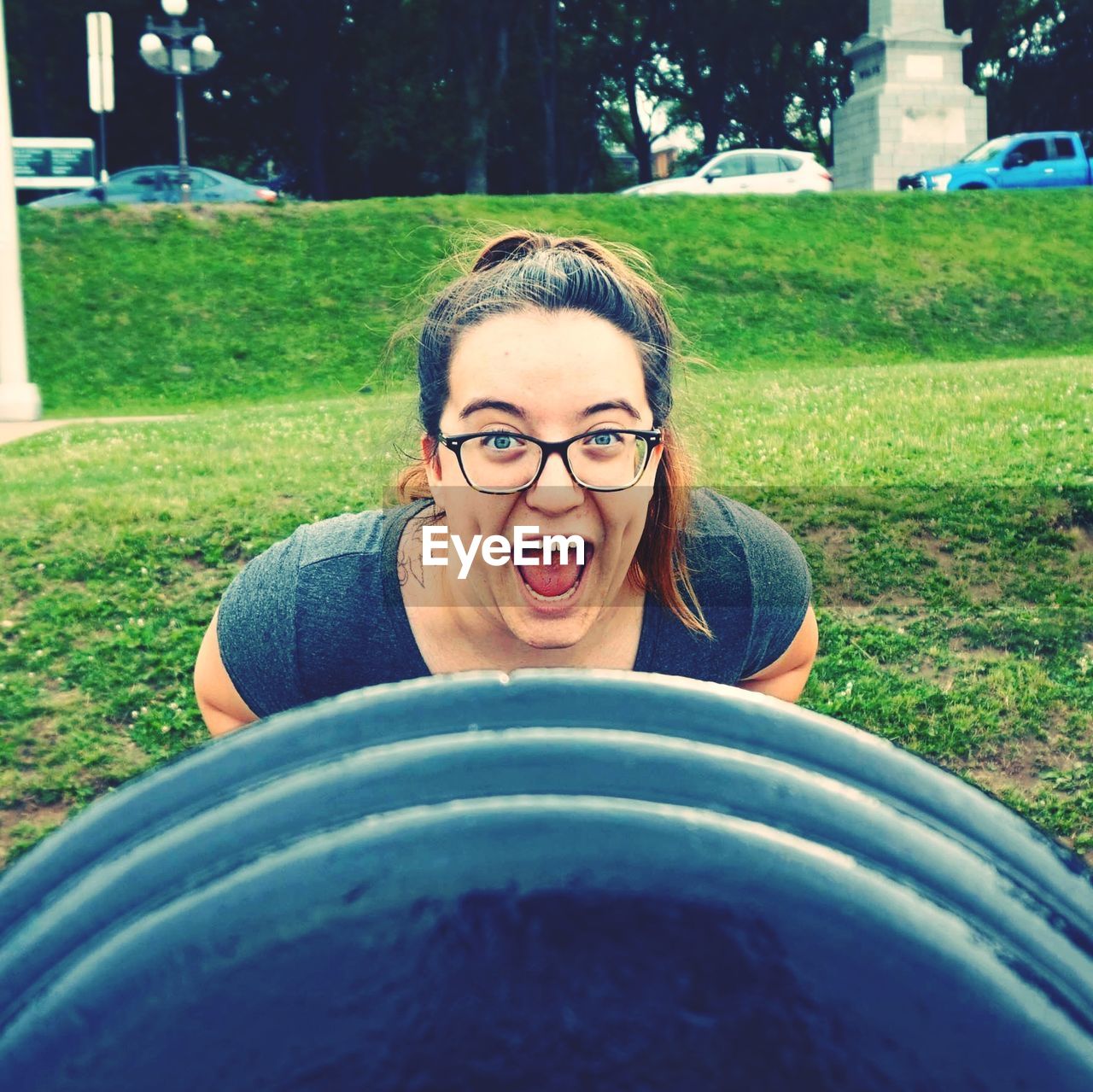 Portrait of happy woman on field