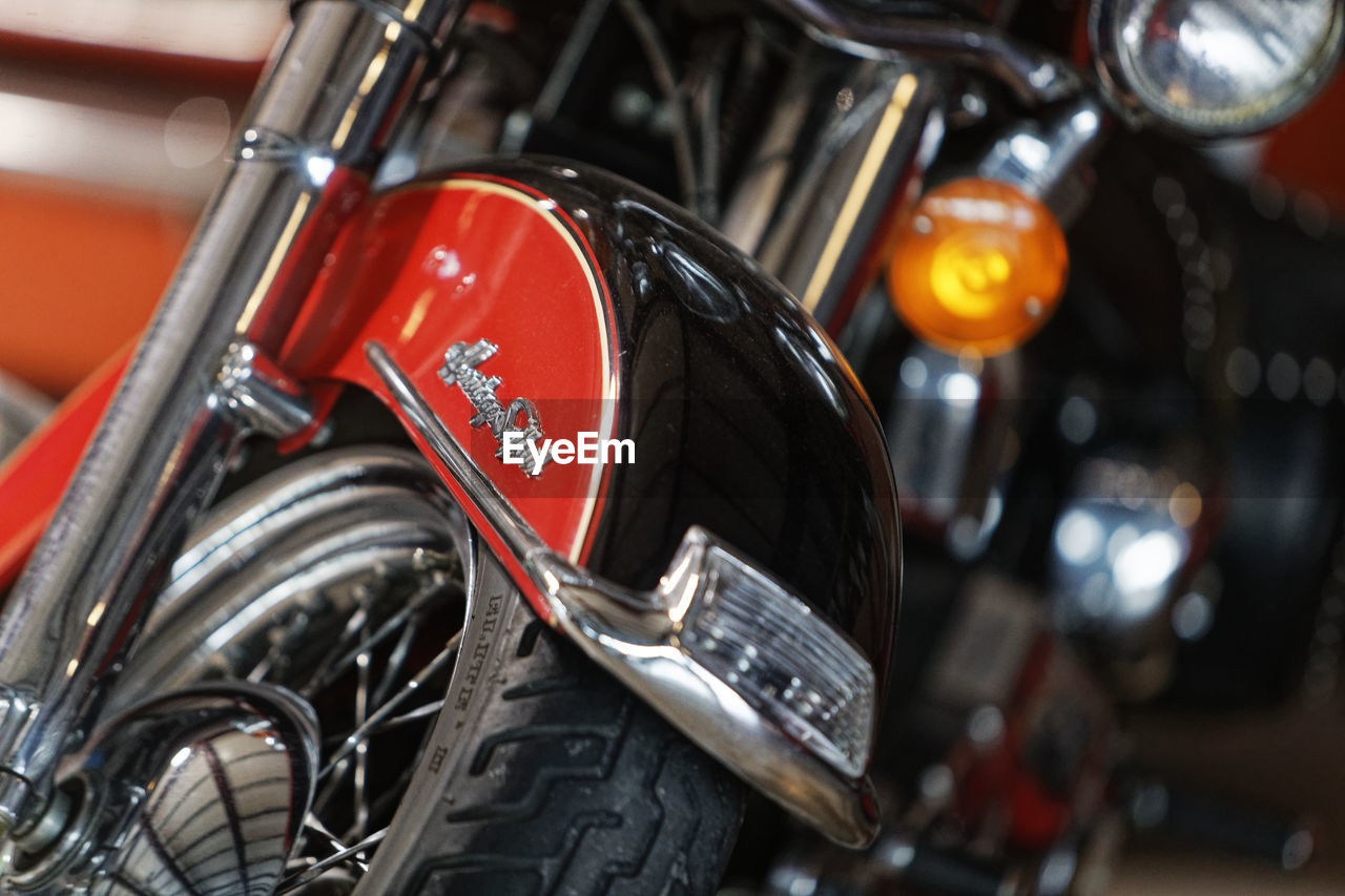 CLOSE-UP OF MOTORCYCLE IN CONTAINER