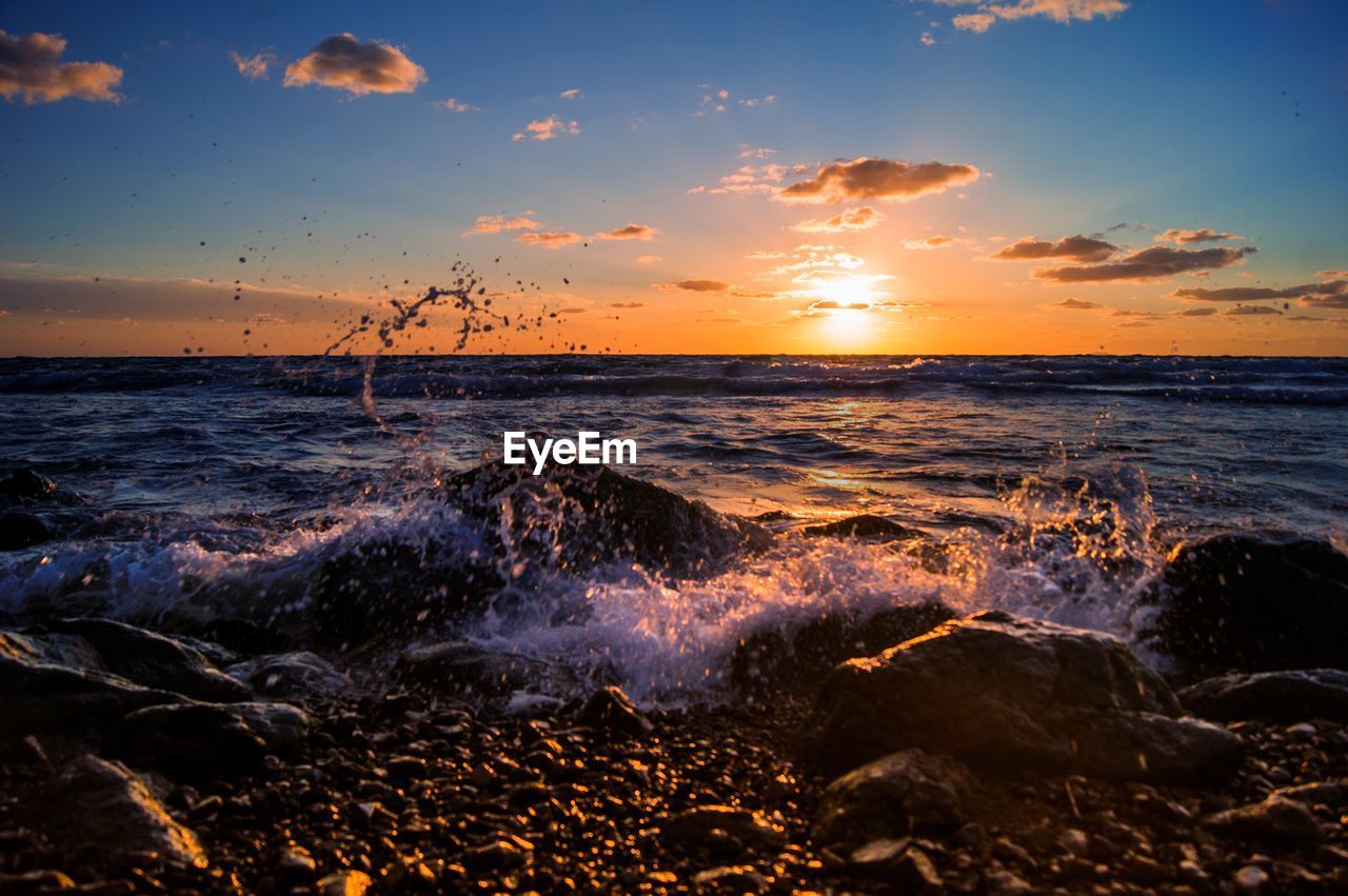 Sea waves splashing on rocks