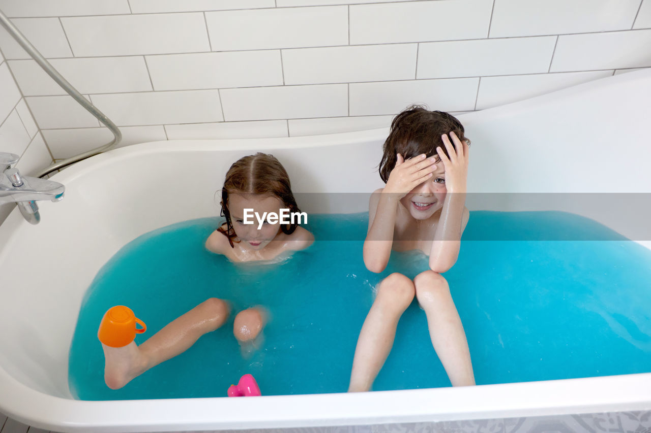 High angle view of children in swimming pool