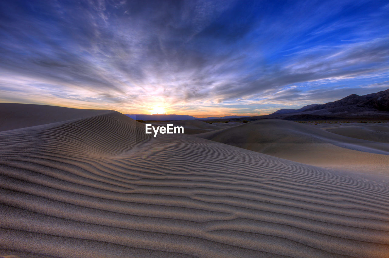 SCENIC VIEW OF DESERT AGAINST SKY