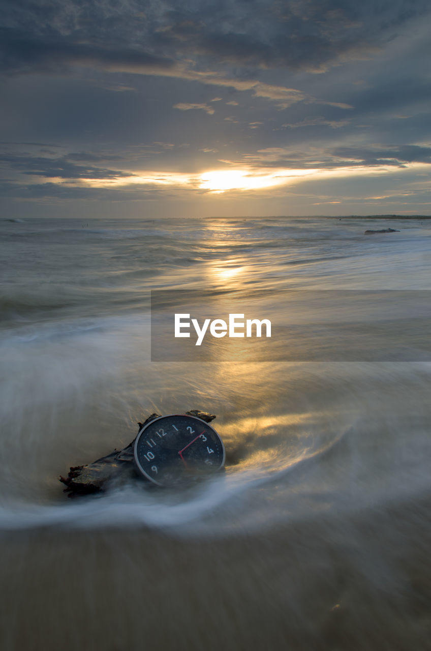 Scenic view of sea during sunset