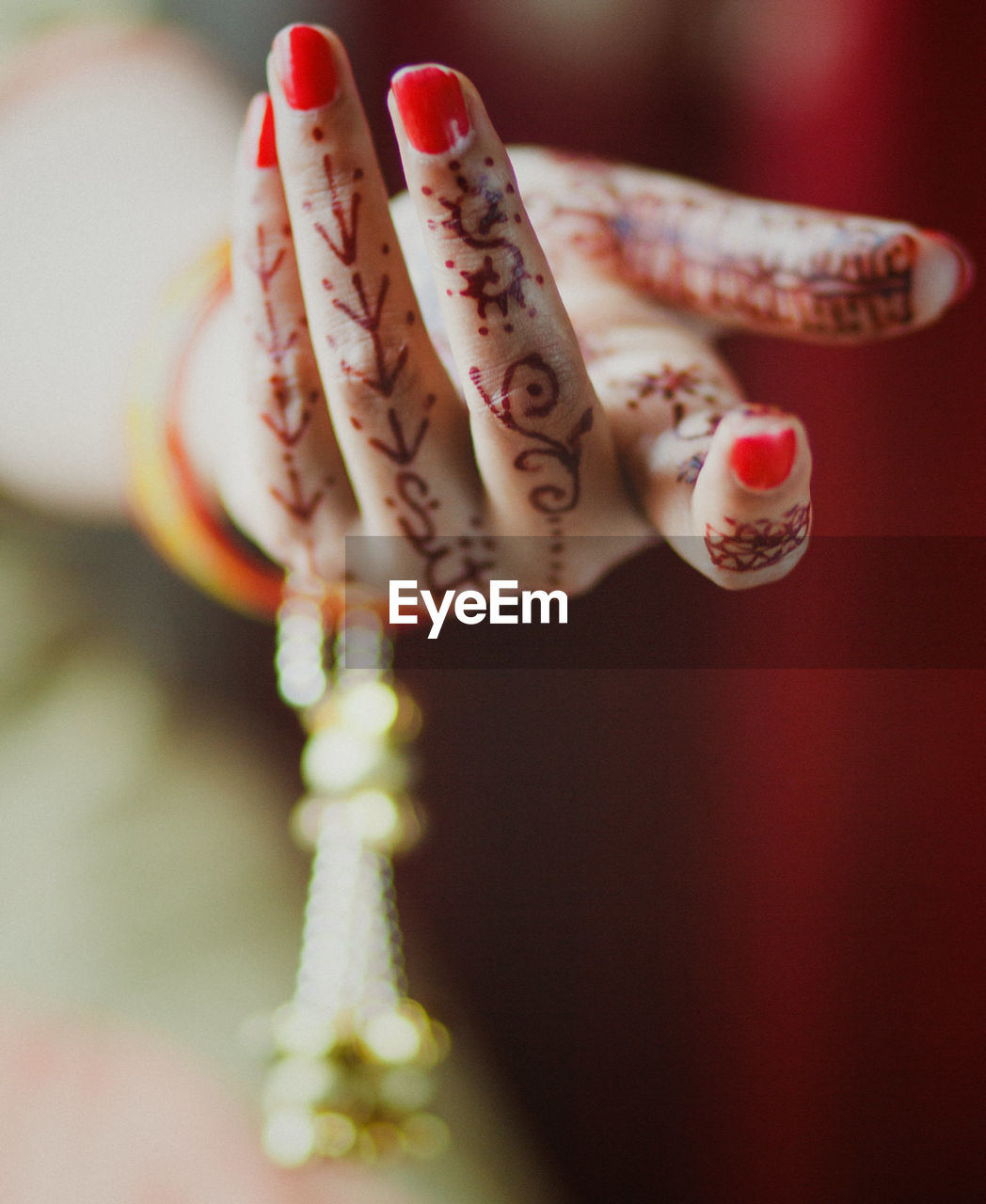 Close-up of female hand with henna tattoo