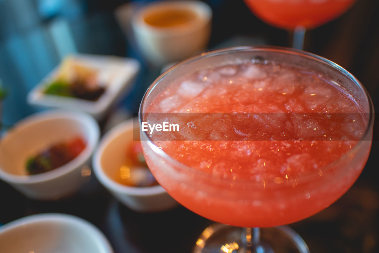 Close up of tiny welcome colorful cocktail set for hotel guest.