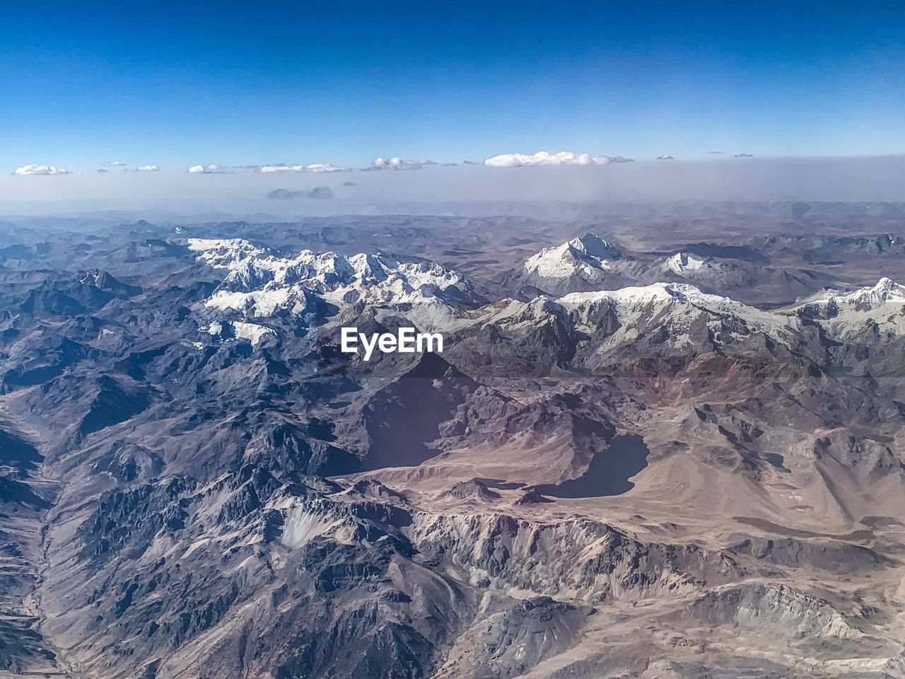 Aerial view of dramatic landscape against sky