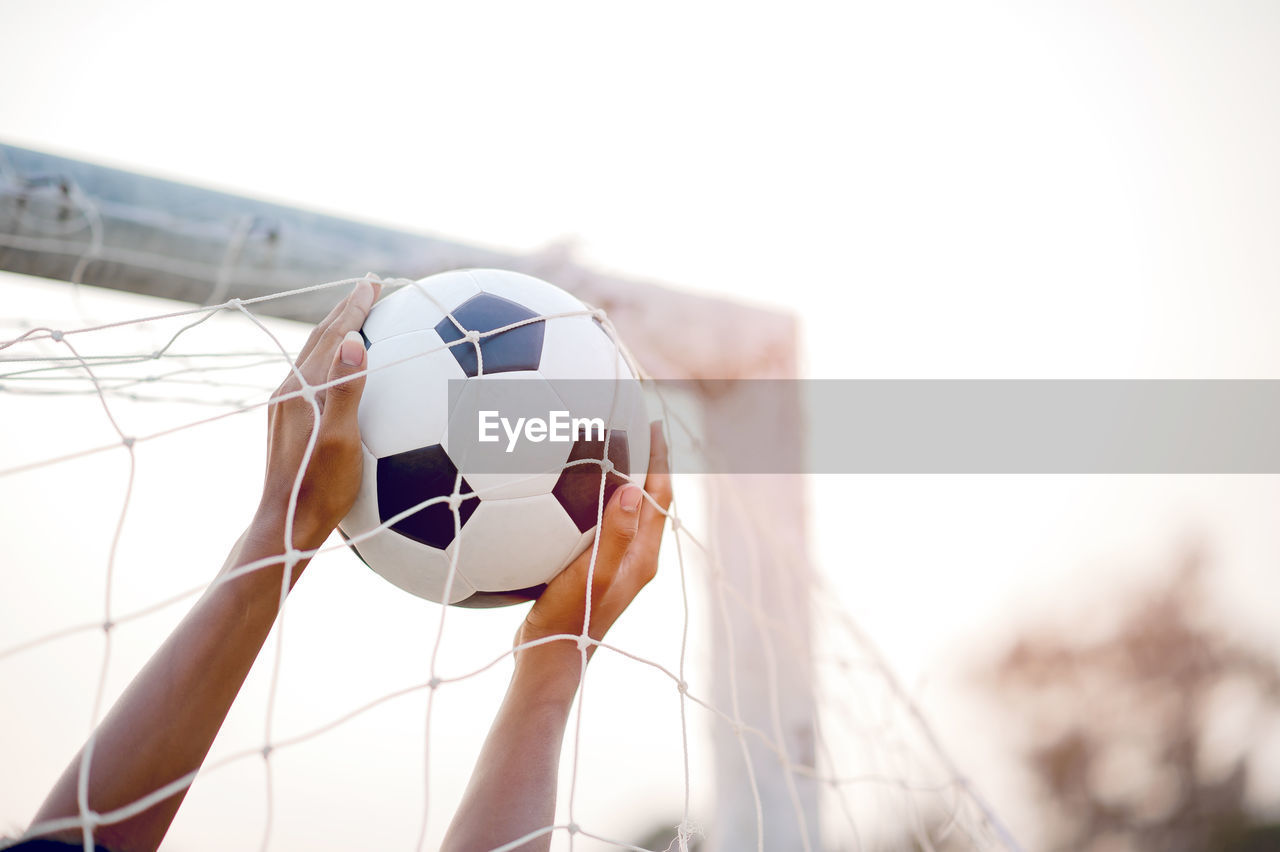 LOW ANGLE VIEW OF A BALL