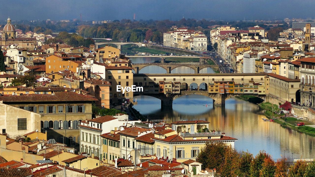 High angle view of river amidst cityscape