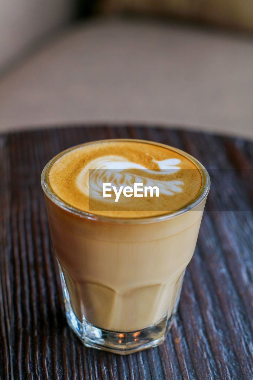 Close-up of cappuccino on table