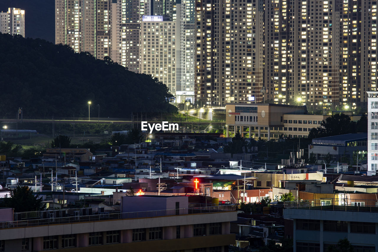 illuminated buildings in city at night