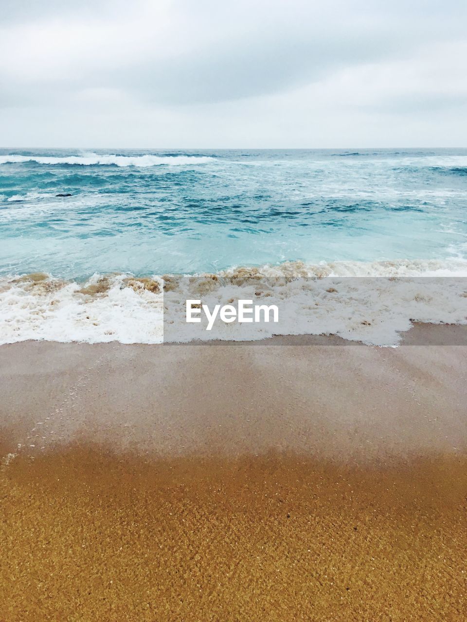 VIEW OF BEACH AGAINST SKY