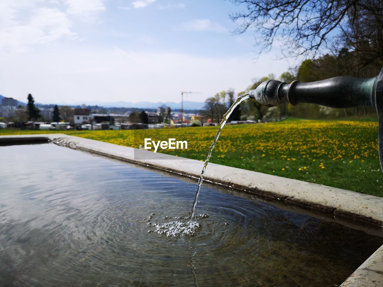 Close-up of water fountain against sky