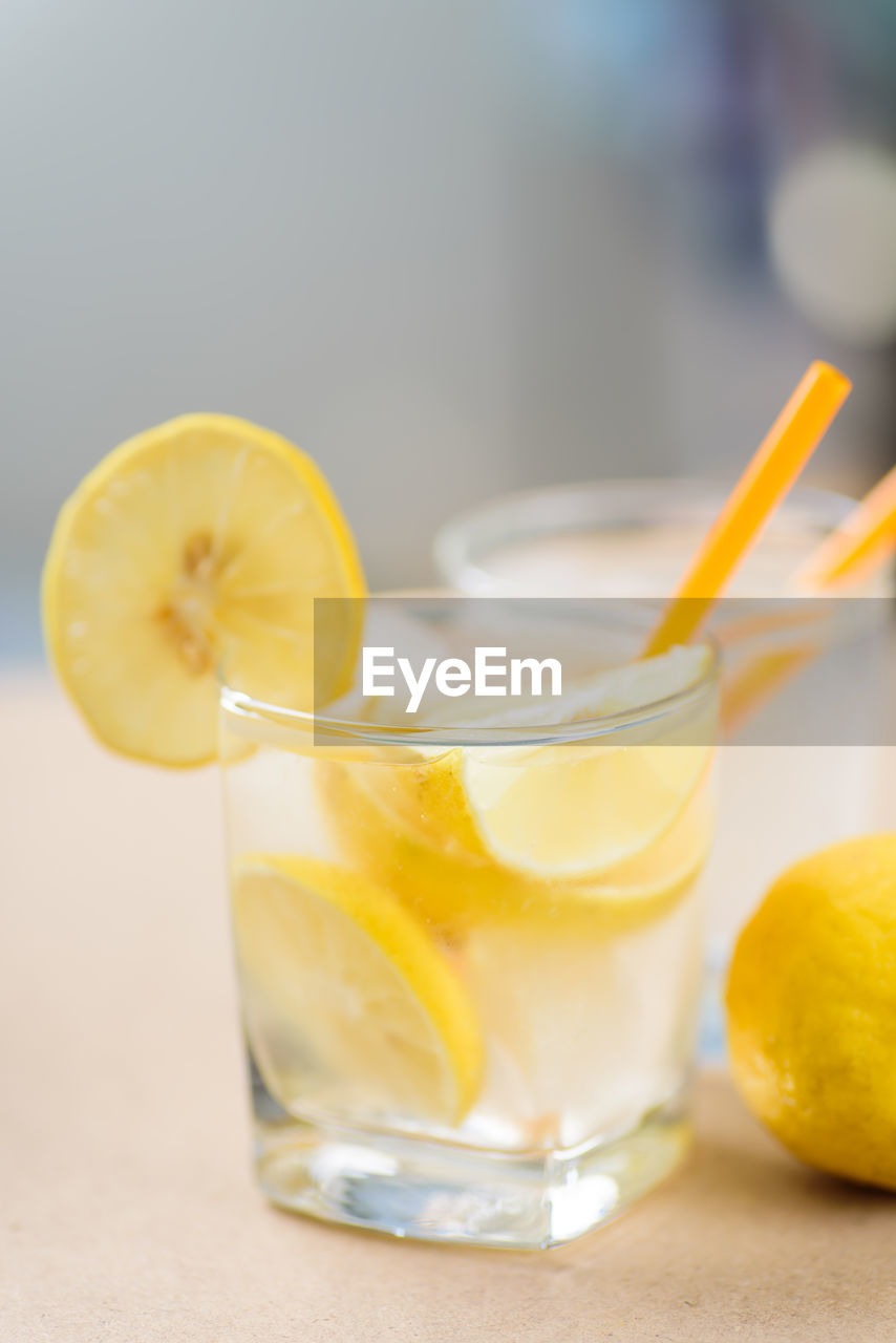 Close-up of lemon slices in glass