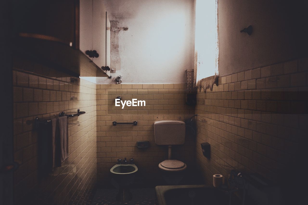 Dirty bathroom in abandoned house