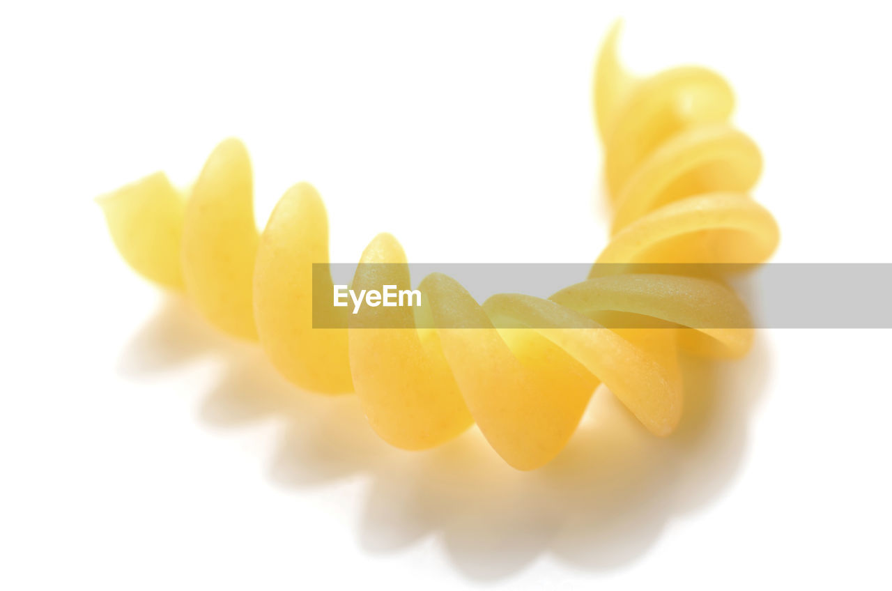 Helix shaped macaroni pasta raw food