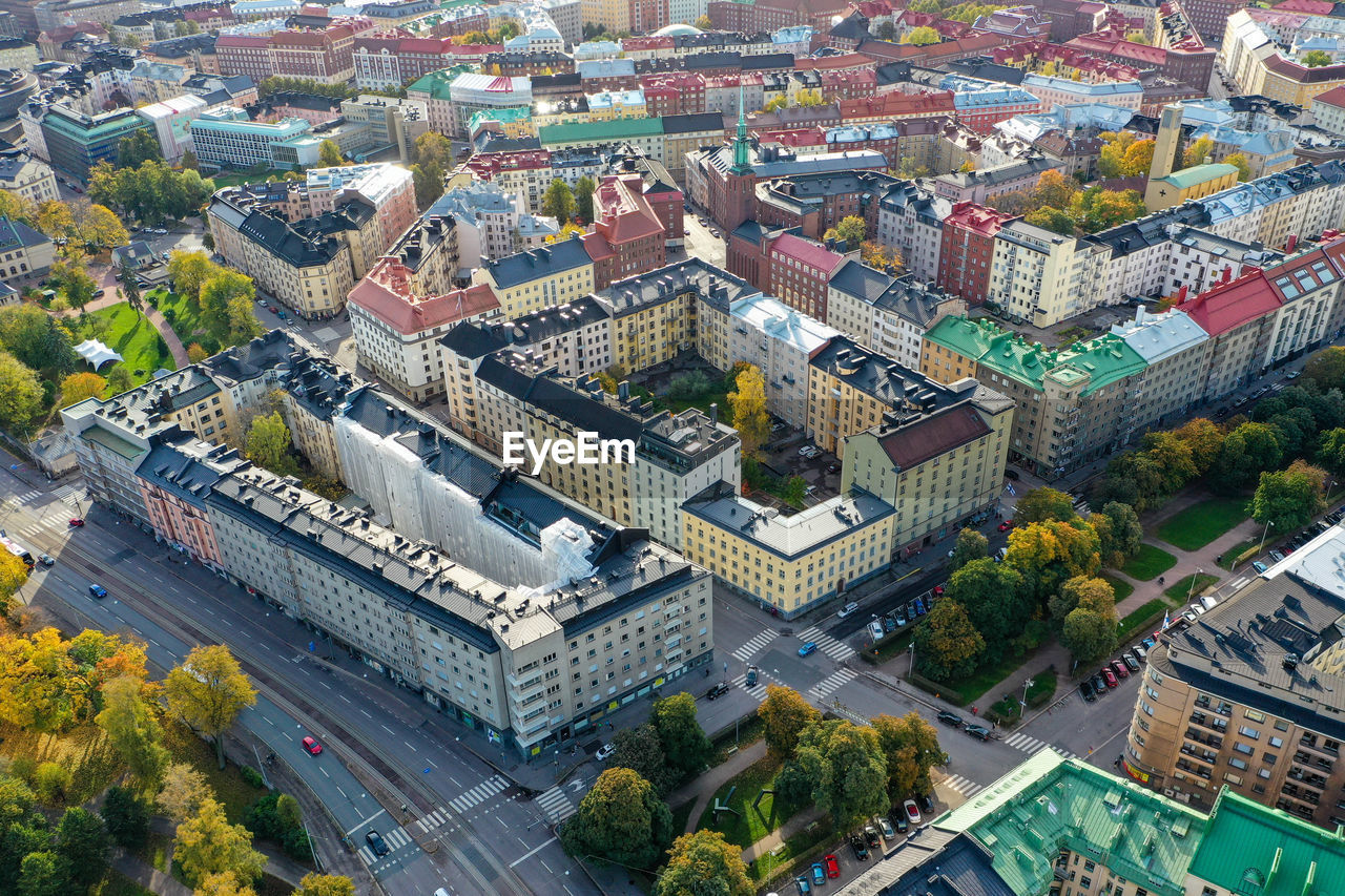 High angle view of buildings and fall colored trees in city