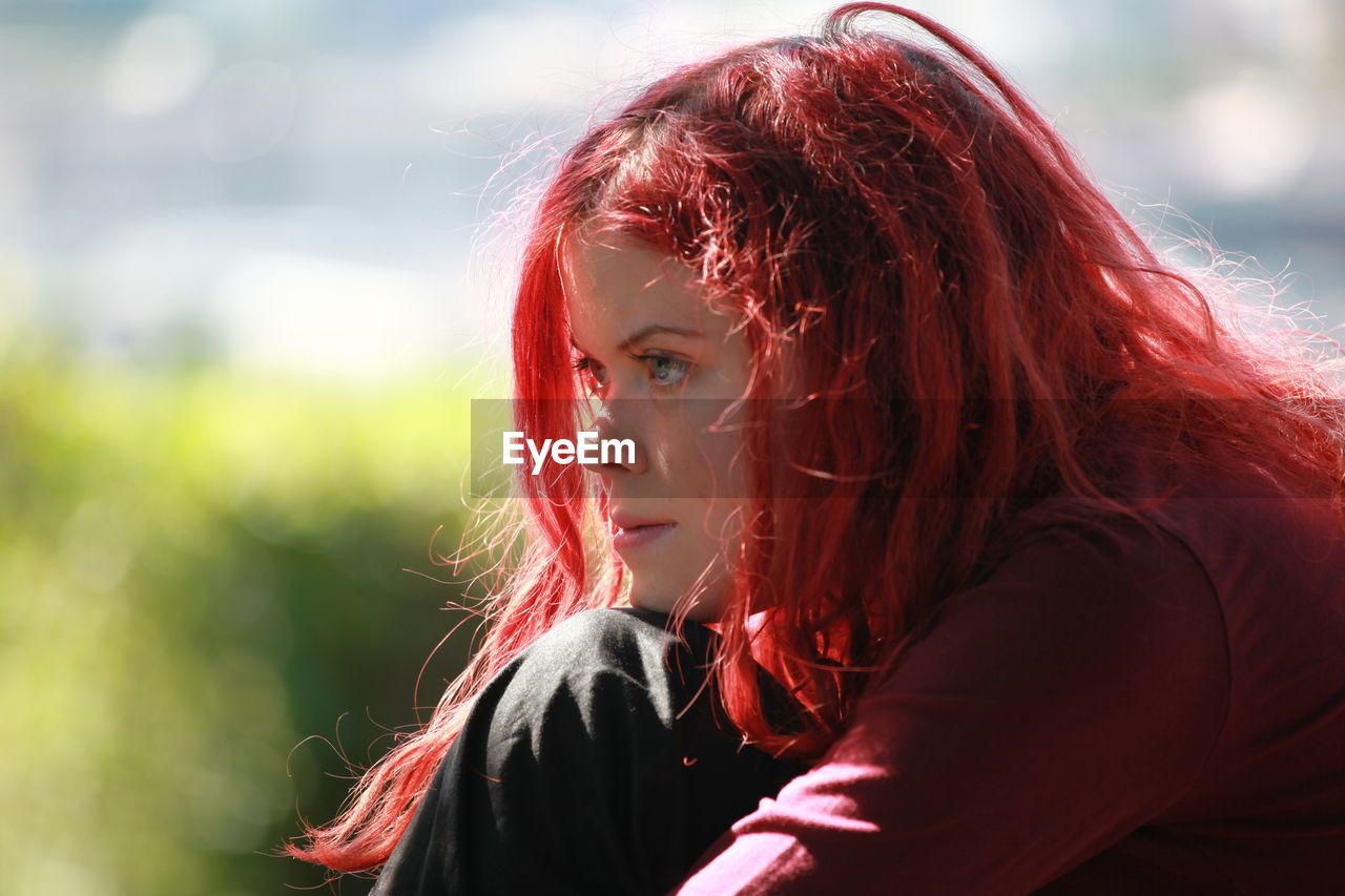 Close-up of beautiful redhead woman