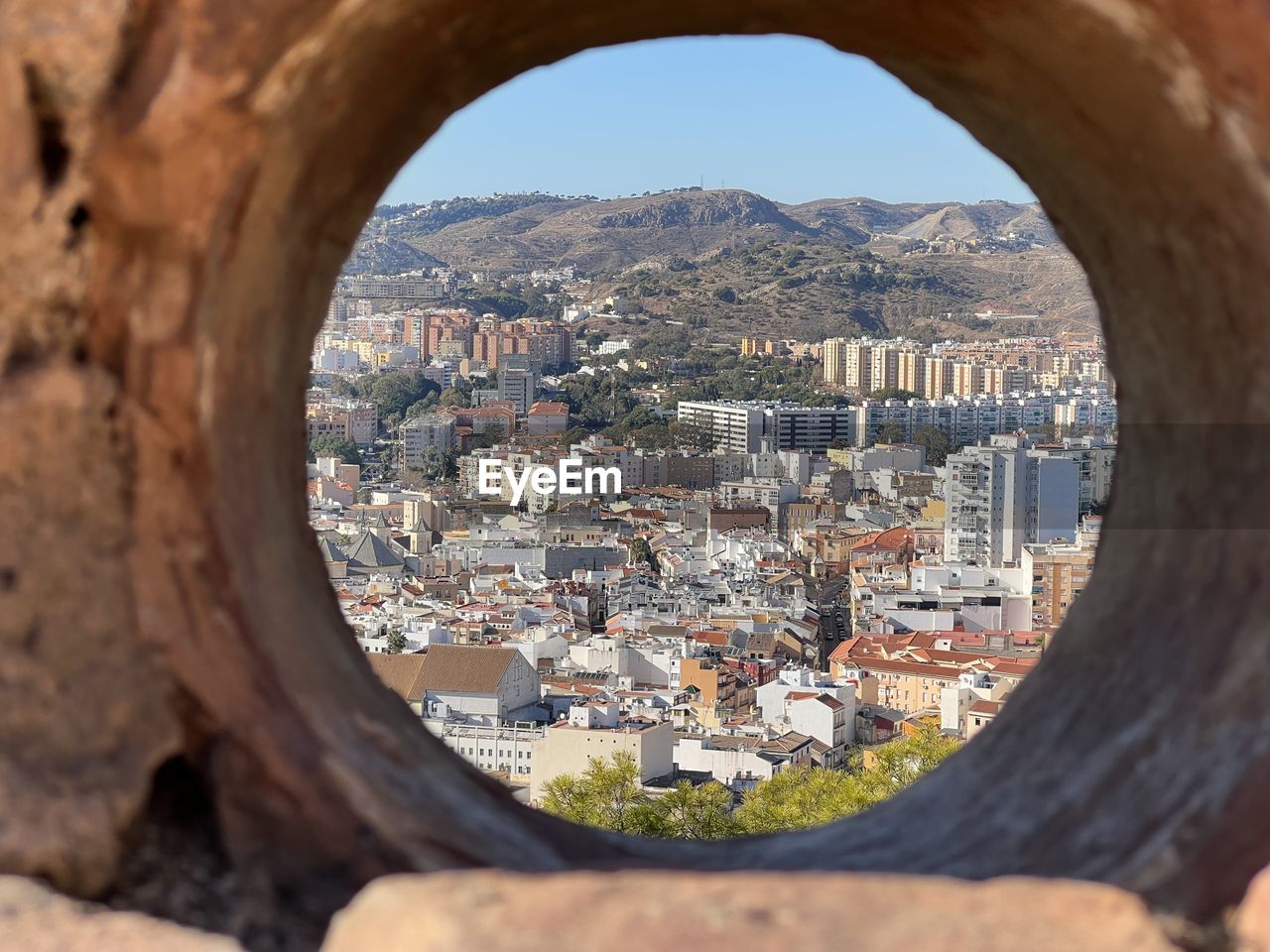 BUILDINGS SEEN THROUGH WINDOW