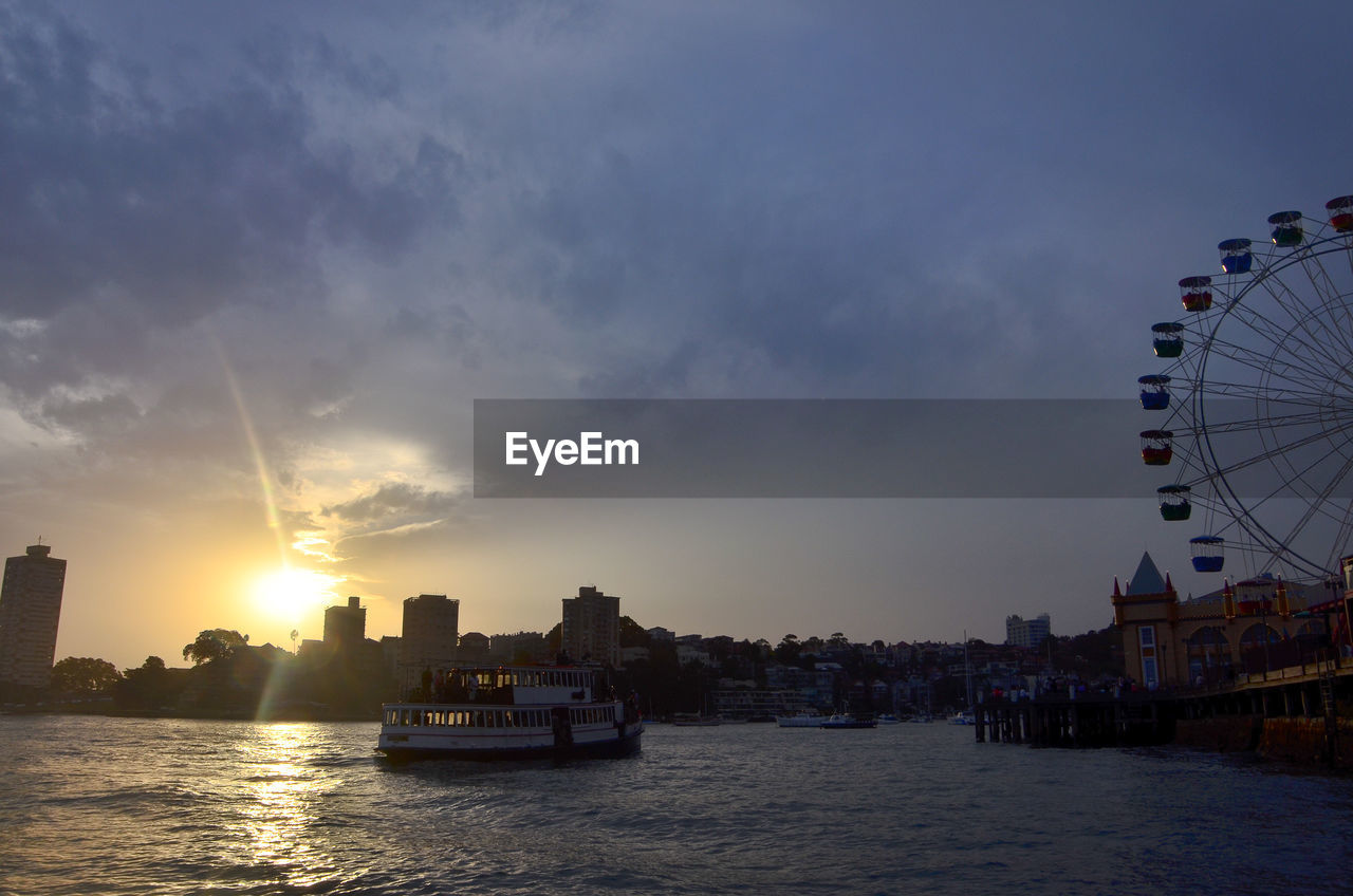 NAUTICAL VESSELS IN CITY AGAINST SKY