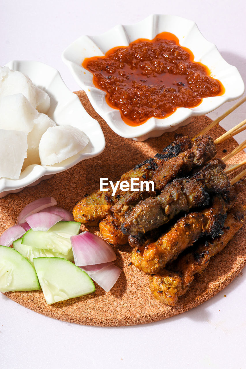 Malaysian satay with delicious peanut sauce, one of famous local dishes