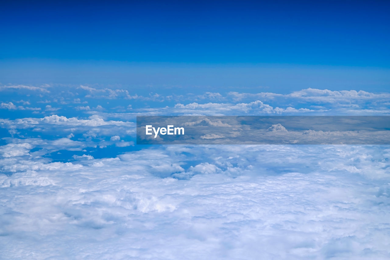 AERIAL VIEW OF CLOUDS IN BLUE SKY