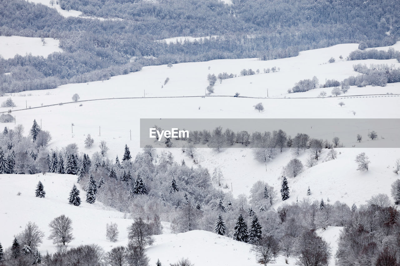 SCENIC VIEW OF SNOW COVERED MOUNTAIN