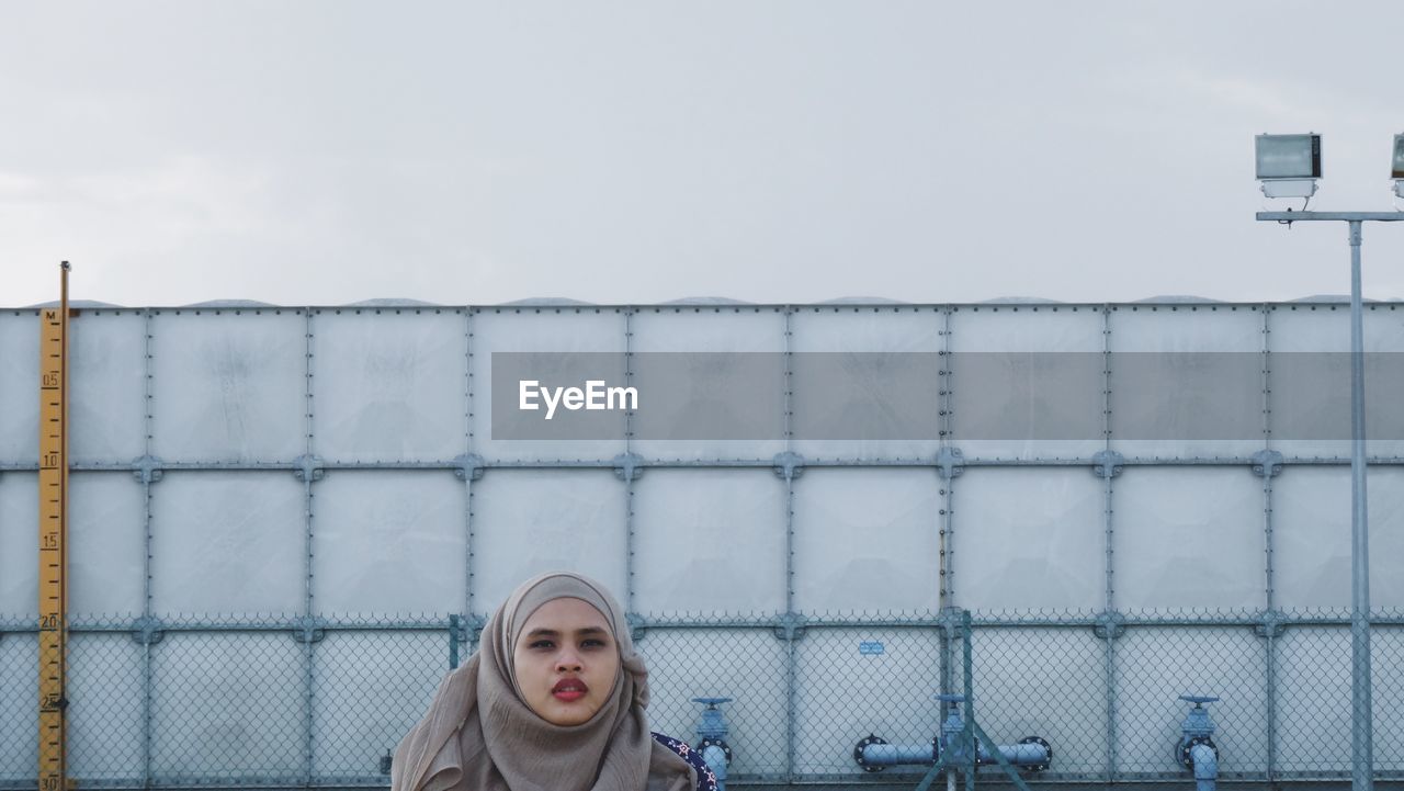 Portrait of young woman wearing hijab