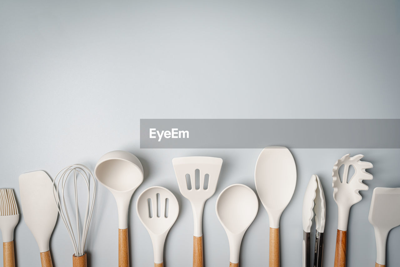 high angle view of pills and spoon on table