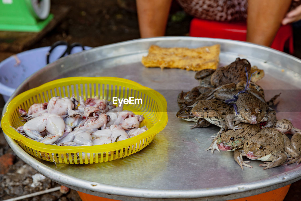 CLOSE-UP OF FISH ON TABLE