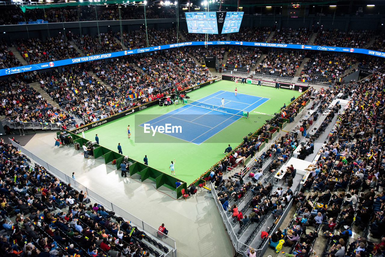 High angle view of crowd at tennis court