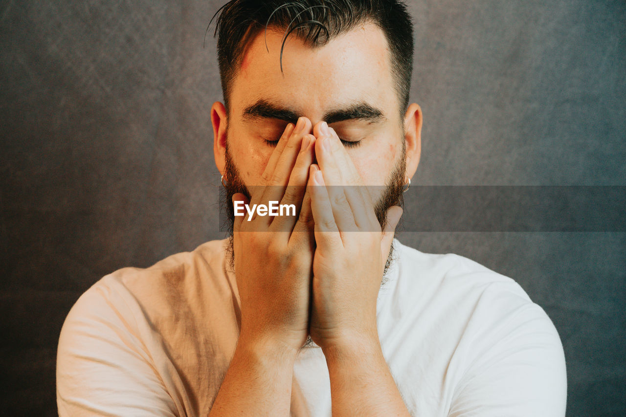 close-up portrait of young man with eyes